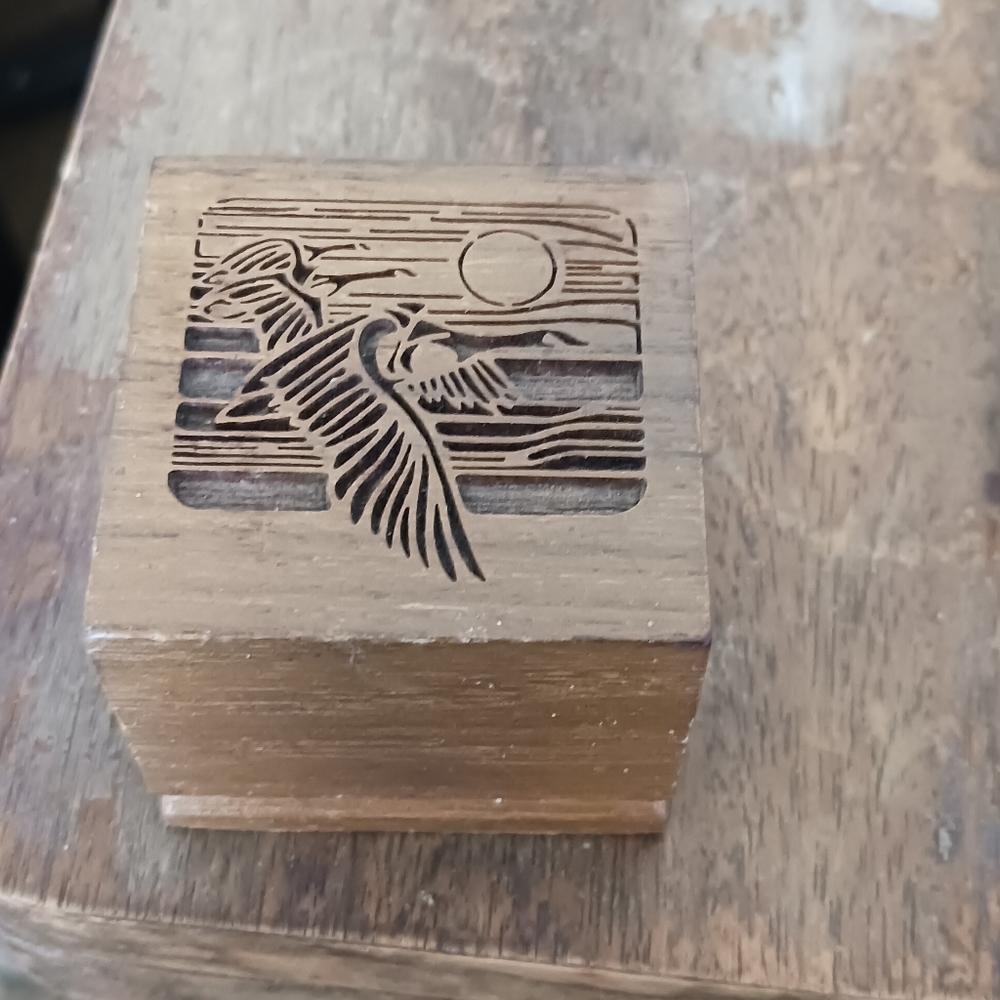 Wood,American walnut Stam holder with Canadian geese carving